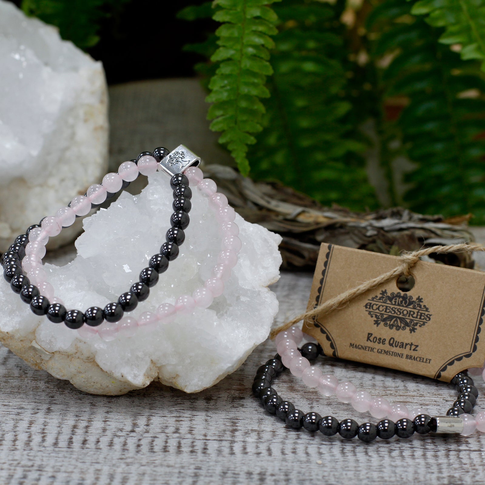 Handcrafted Gemstone Magnetic Bracelet - Rose Quartz / Love and Harmony product packaging on clean background from Quintessential Holistic Health Ltd