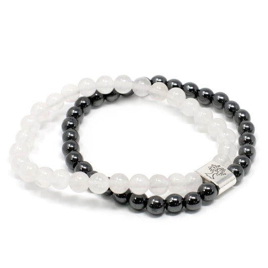Handcrafted Gemstone Magnetic Bracelet - Rock Quartz / Clarity and Focus product packaging on clean background from Quintessential Holistic Health Ltd