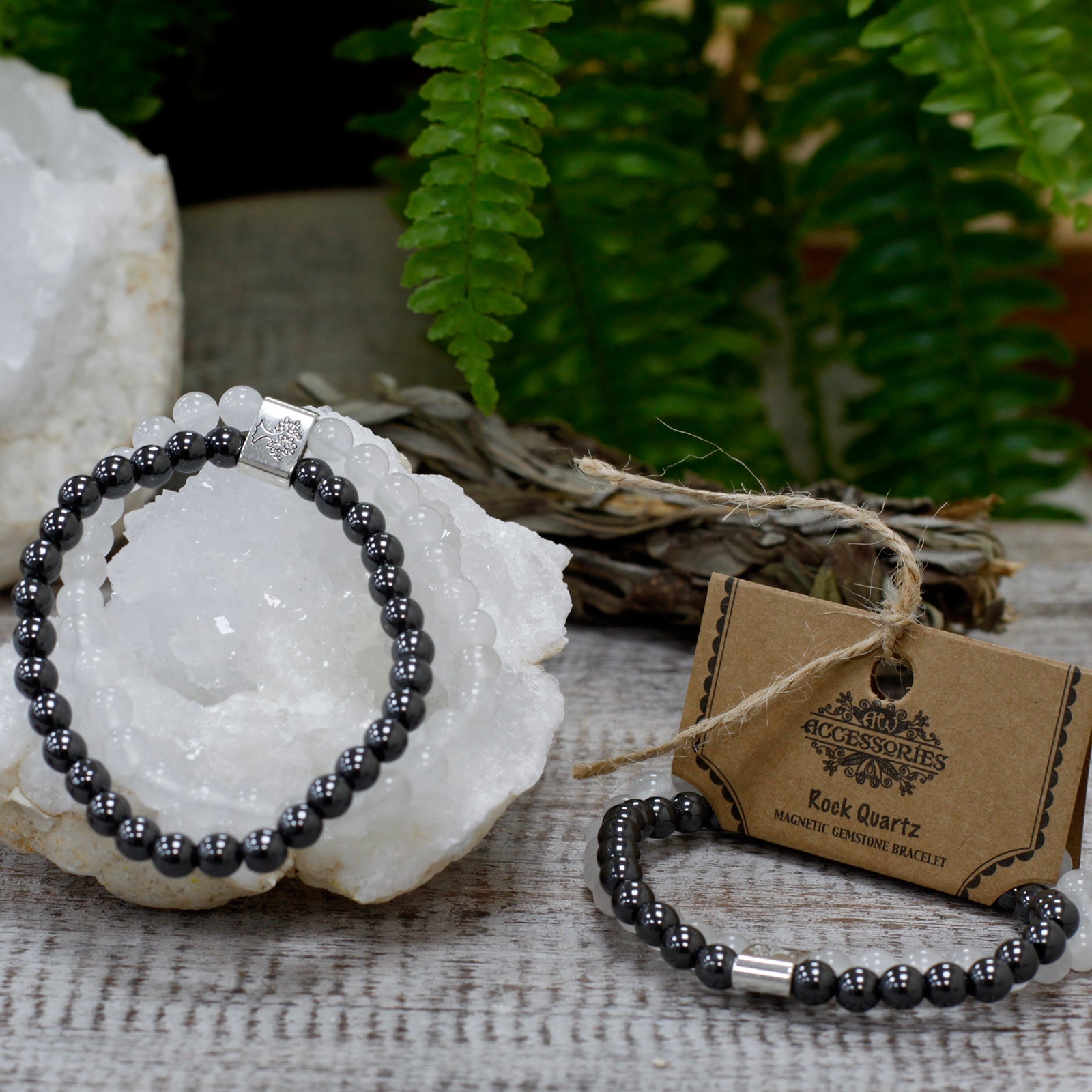 Handcrafted Gemstone Magnetic Bracelet - Rock Quartz / Clarity and Focus product packaging on clean background from Quintessential Holistic Health Ltd