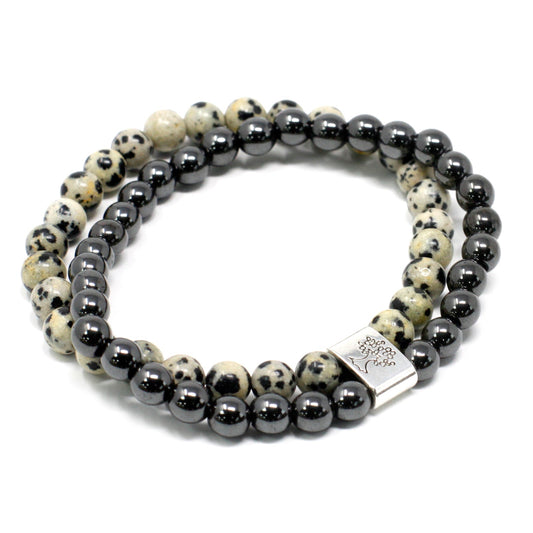 Handcrafted Gemstone Magnetic Bracelet - Dalmatian Jasper / Grounding and Protection product packaging on clean background from Quintessential Holistic Health Ltd