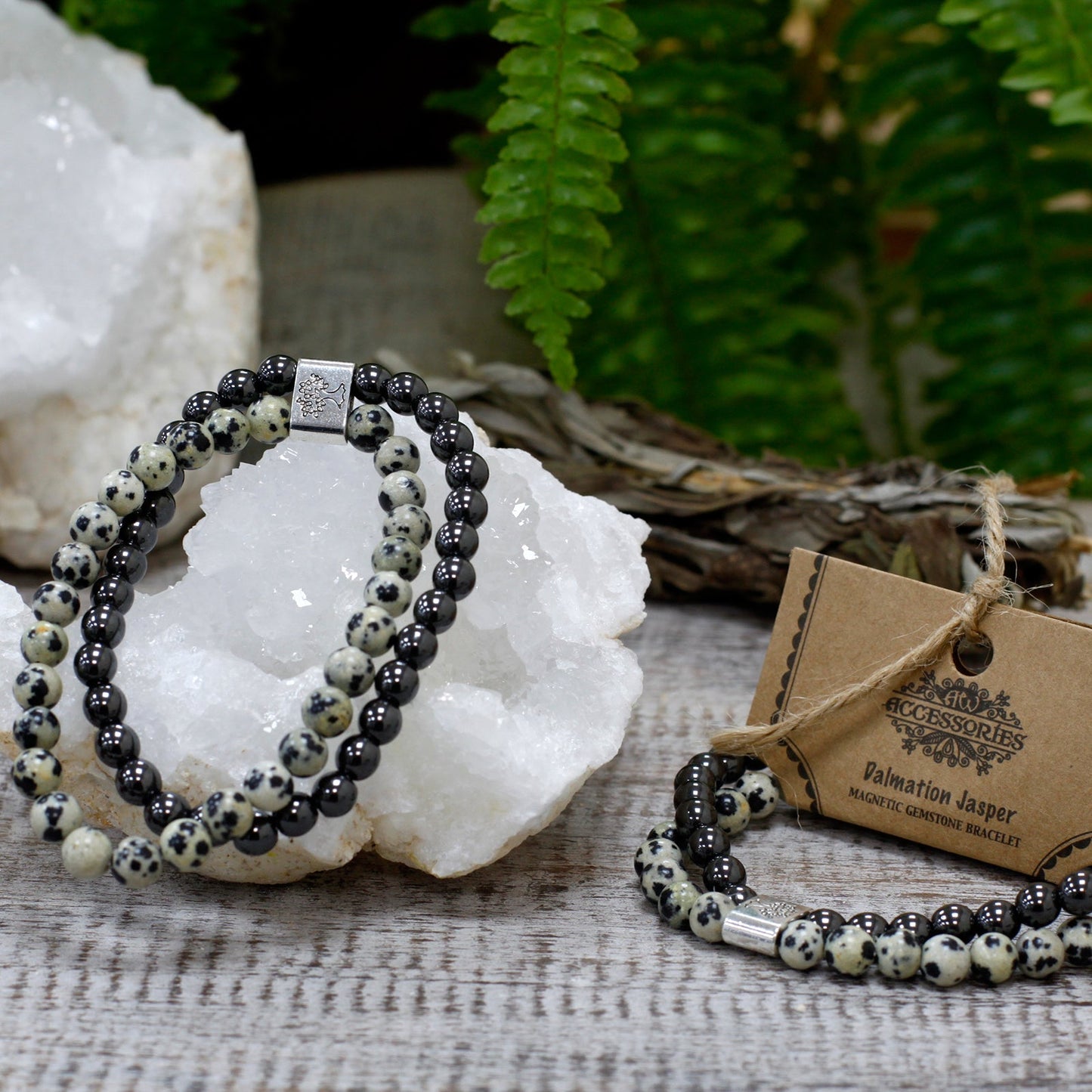 Handcrafted Gemstone Magnetic Bracelet - Dalmatian Jasper / Grounding and Protection product packaging on clean background from Quintessential Holistic Health Ltd