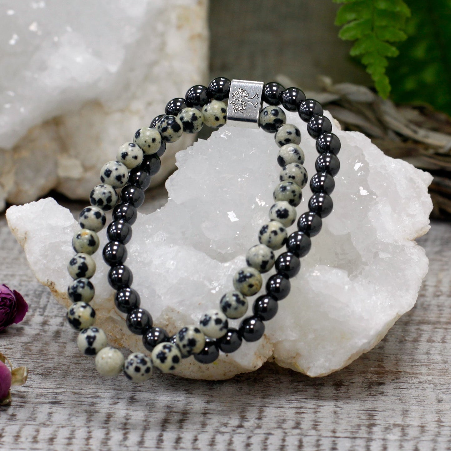 Handcrafted Gemstone Magnetic Bracelet - Dalmatian Jasper / Grounding and Protection product packaging on clean background from Quintessential Holistic Health Ltd