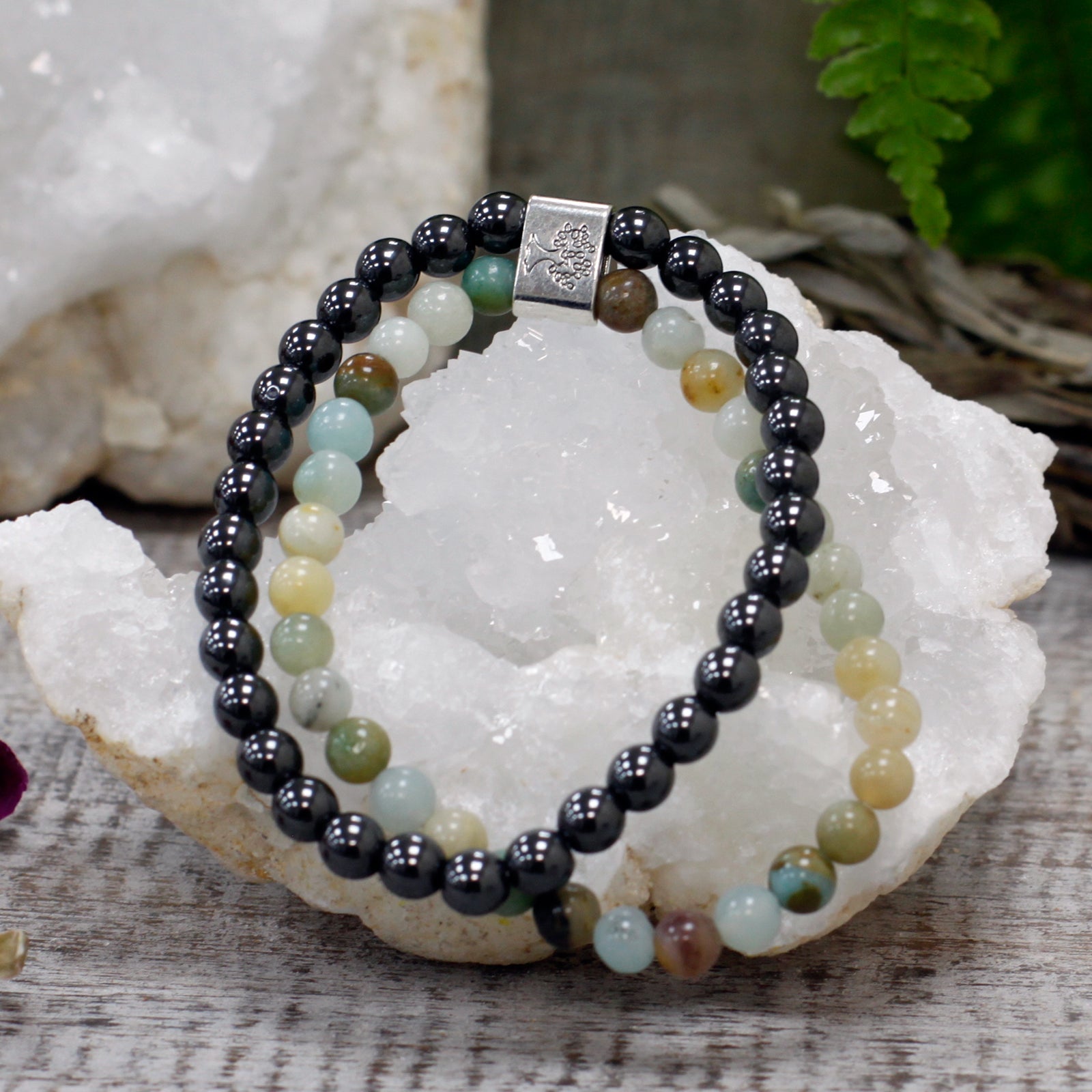 Handcrafted Gemstone Magnetic Bracelet - Amazonite / Emotional Balance and Self Expression product packaging on clean background from Quintessential Holistic Health Ltd