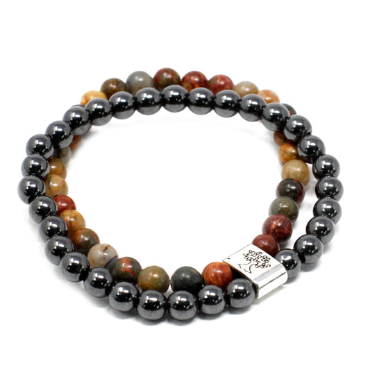 Handcrafted Gemstone Magnetic Bracelet - Picasso Jasper / Grounding and Self Discipline product packaging on clean background from Quintessential Holistic Health Ltd