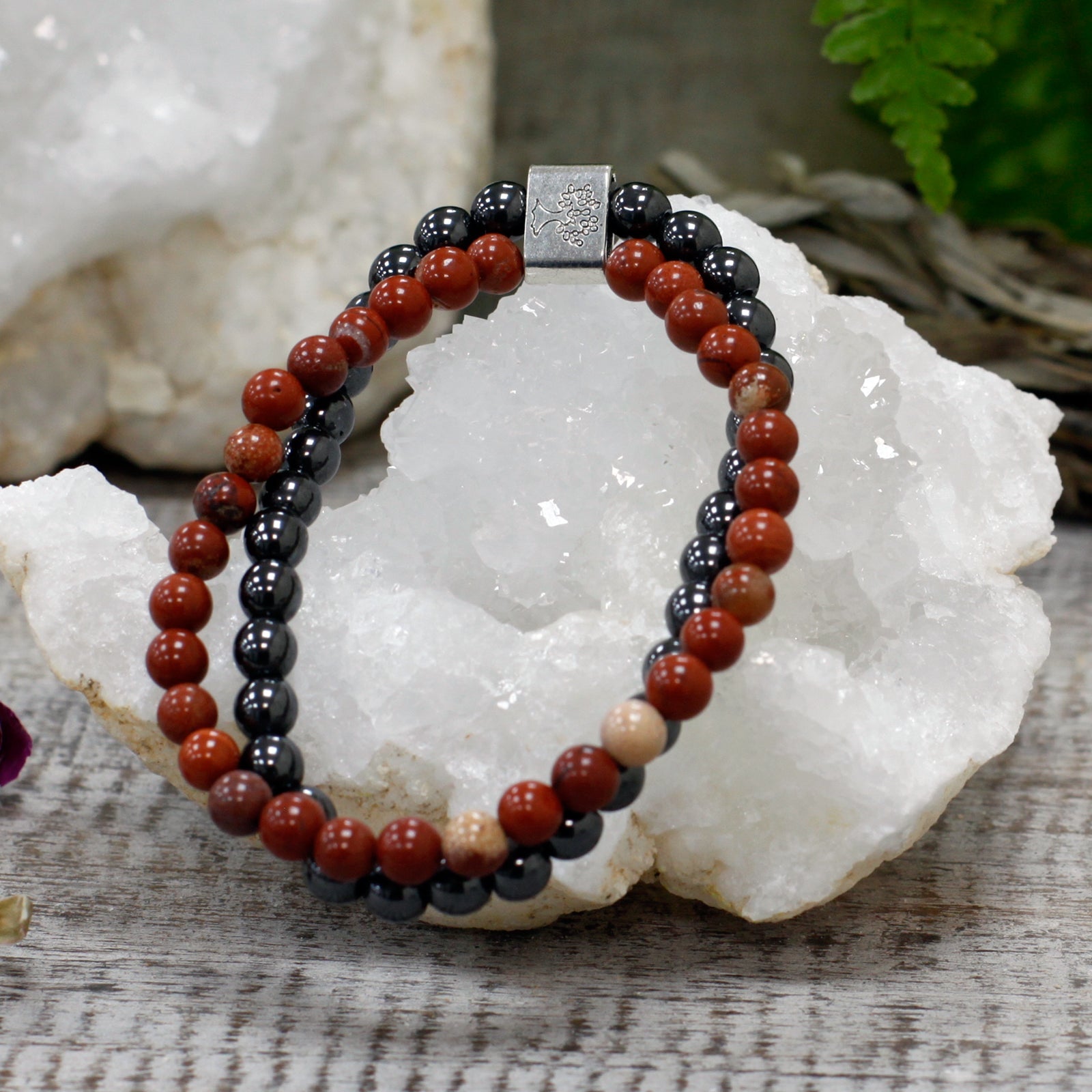Handcrafted Gemstone Magnetic Bracelet - Redstone / Vitality and Passion product packaging on clean background from Quintessential Holistic Health Ltd