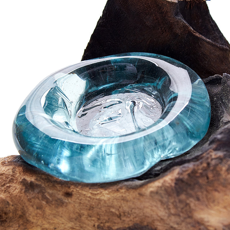 Recycled Glass Candle Holder on Wood - Single Round - Blue showing a close view of the thick rounded blue glass rim on dark wood by Quintessential Holistic Health Ltd