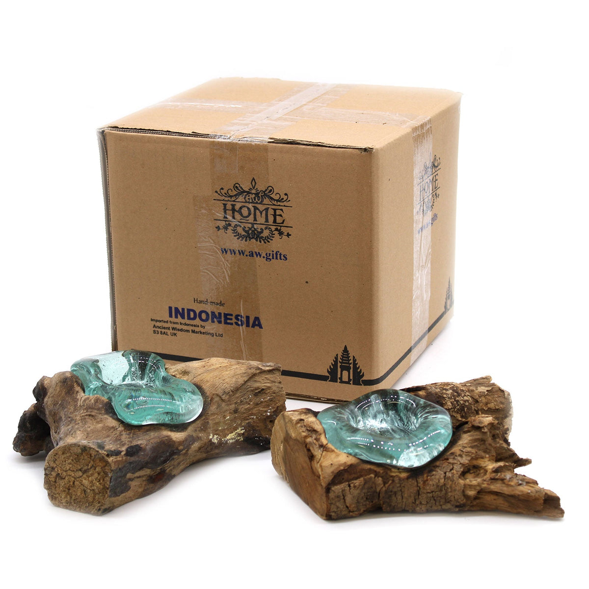 Recycled Glass Candle Holder on Wood - Single Round - Blue shown as two wood-mounted aqua glass cups beside a cardboard box by Quintessential Holistic Health Ltd