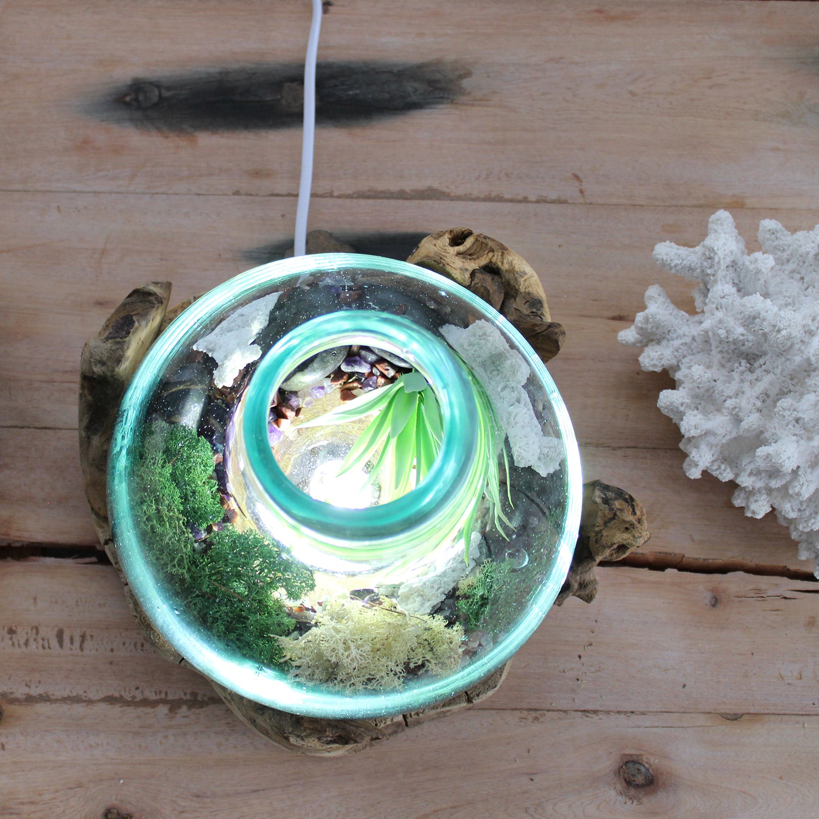 Handmade Molten Recycled Glass Vase with Light on Wood - Oval / Clear / Light Blue product packaging on clean background from Quintessential Holistic Health Ltd