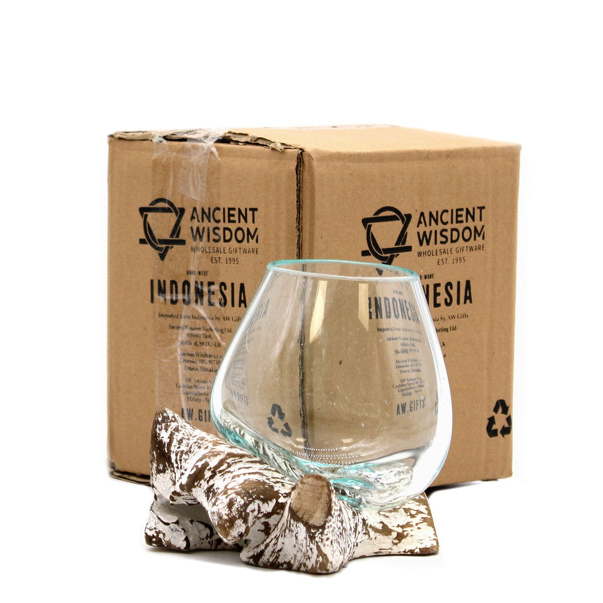 Recycled Glass Vase - Small Oval - Clear/Blue - Whitewash, with a rounded bowl displayed before two branded cardboard boxes by Quintessential Holistic Health Ltd