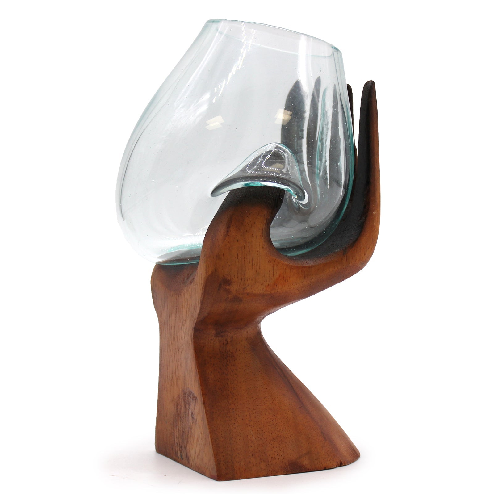 Recycled Glass Vase on Wood - Oval - Light Blue, with a clear asymmetric glass bowl cradled by an upright carved wooden hand, by Quintessential Holistic Health Ltd