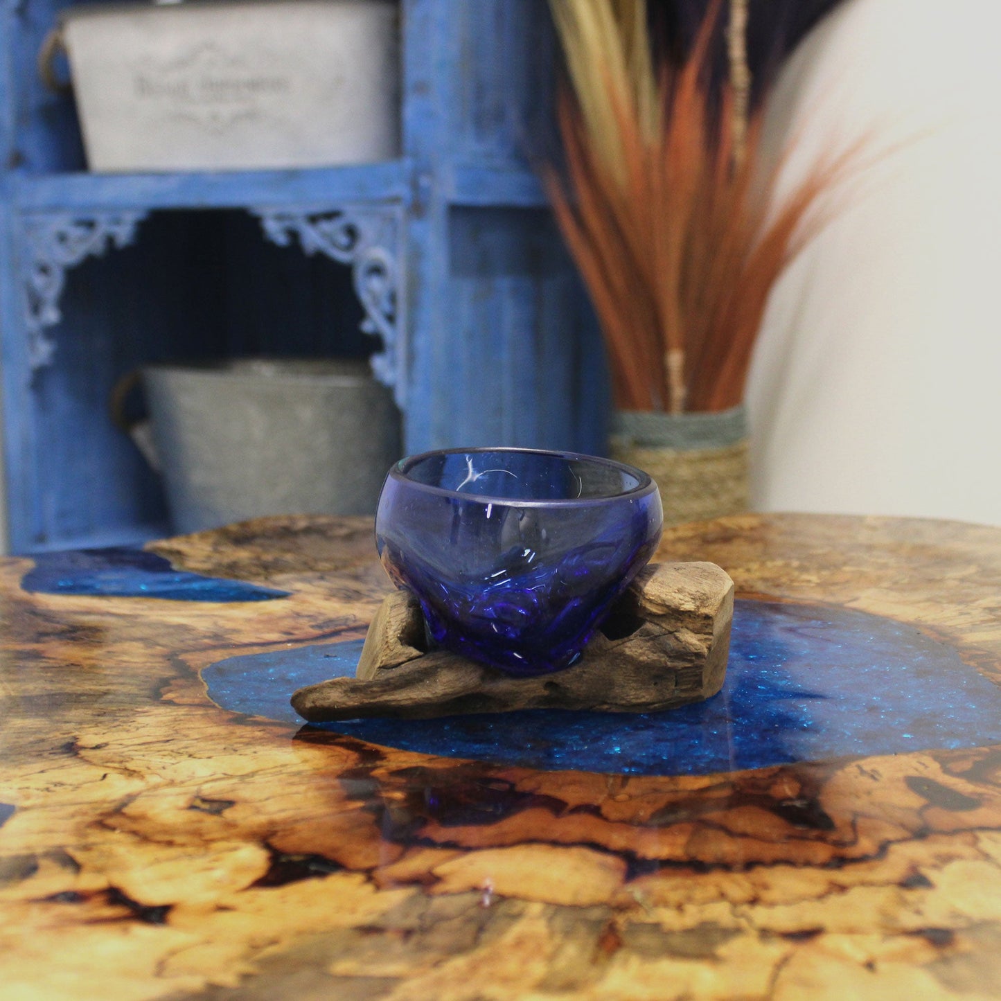 Handmade Molten Recycled Glass Vase on Wood - Clear / Round / Blue product packaging on clean background from Quintessential Holistic Health Ltd
