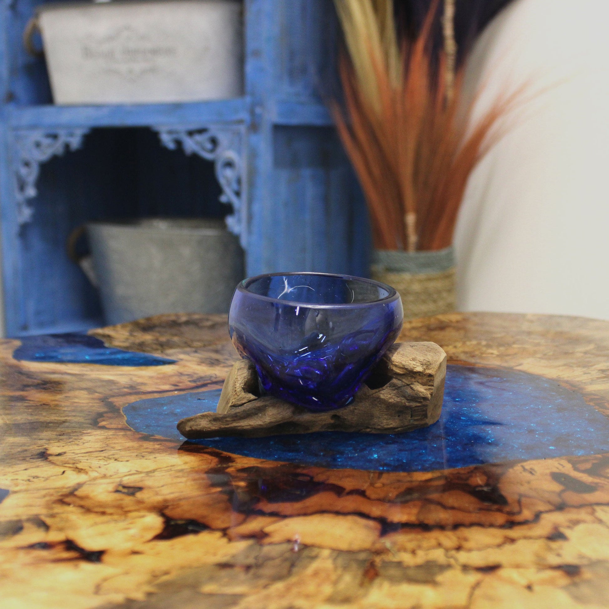 Handmade Molten Recycled Glass Vase on Wood - Clear / Round / Blue product packaging on clean background from Quintessential Holistic Health Ltd