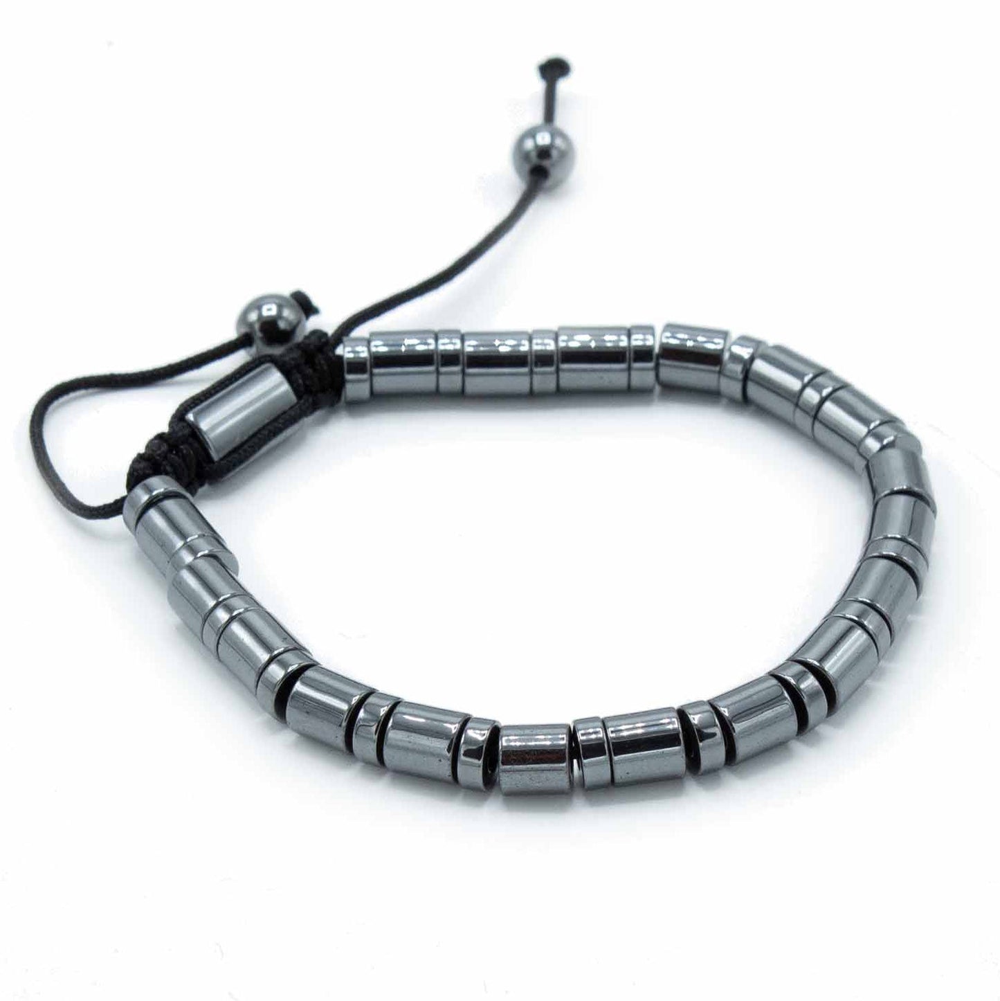 Unisex Magnetic Hematite Shamballa Bracelet - Cylinders and Circles product packaging on clean background from Quintessential Holistic Health Ltd