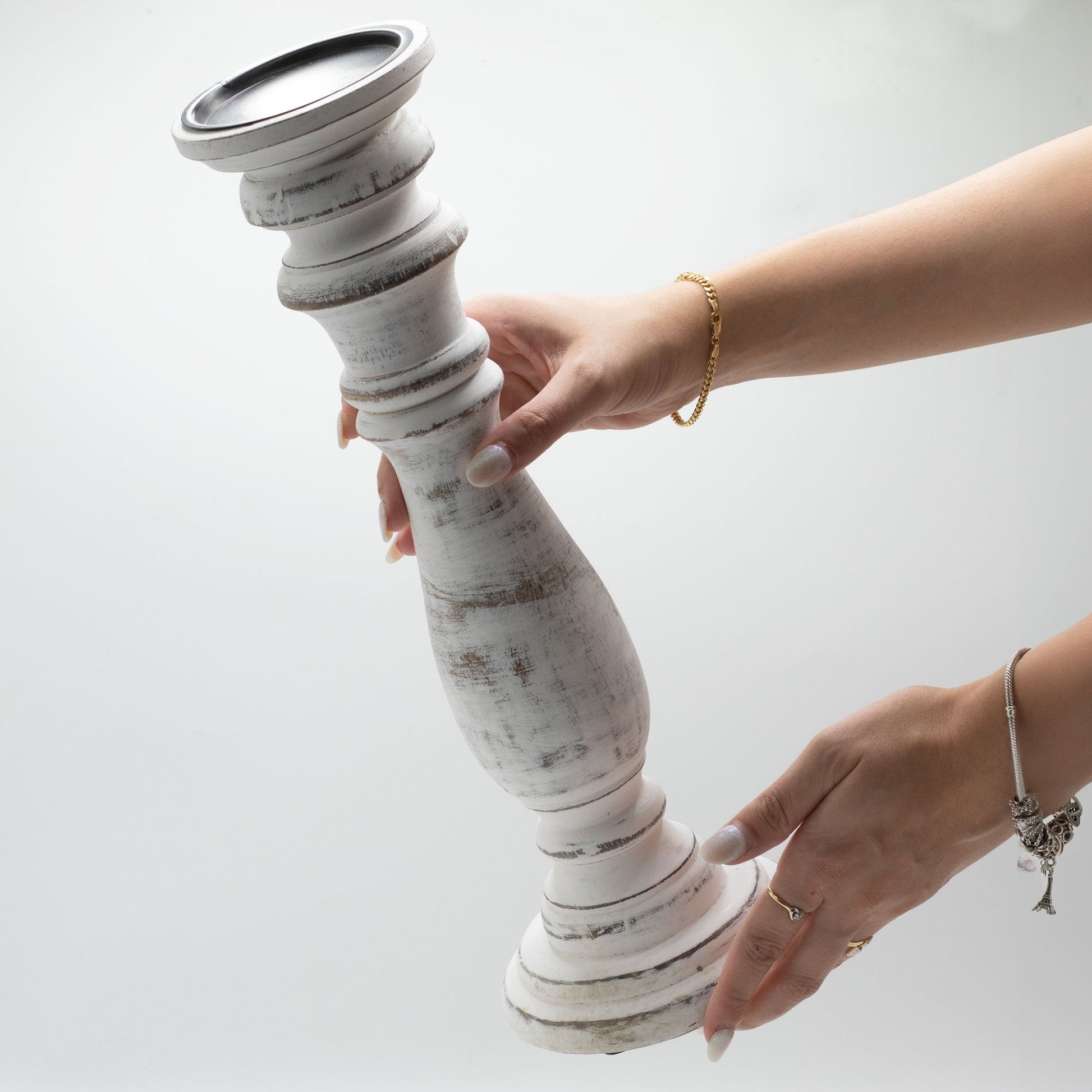 Large Handmade Mango Wood Candle Stand - Whitewash, tall curved stand held upright between two hands by Quintessential Holistic Health Ltd