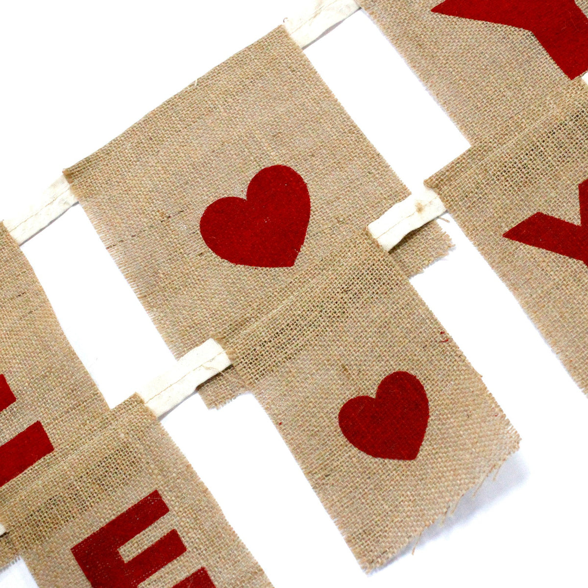 Natural Cotton Bunting - I Love You with Hearts showing overlapping beige panels with red hearts and letters by Quintessential Holistic Health Ltd