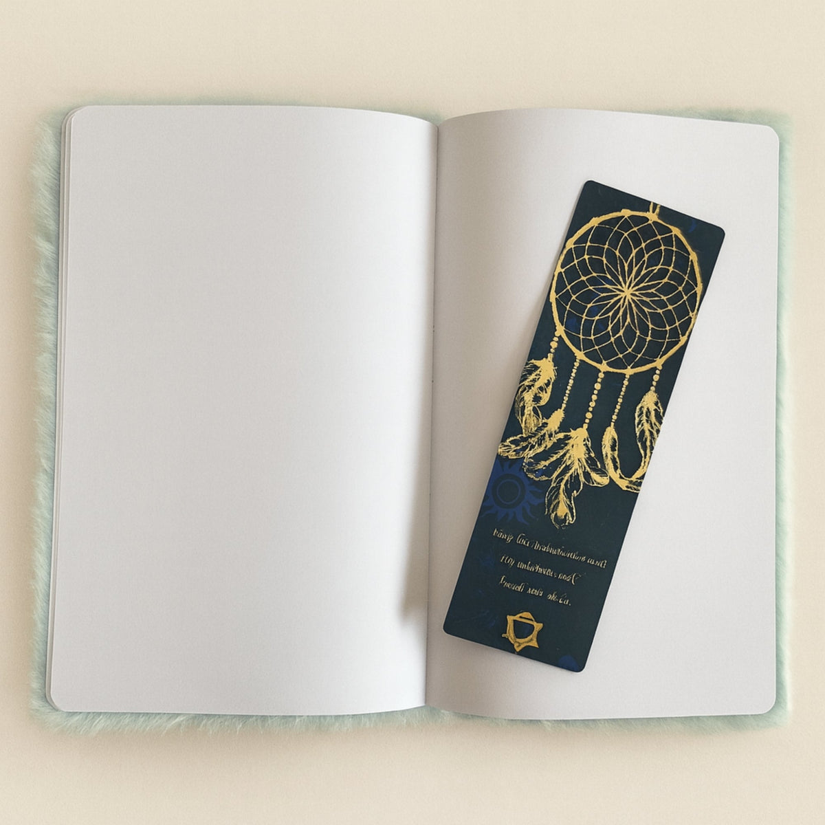 Soft Journal - A5 - Pastel Blue and Yellow - Moonlight Messages, open to blank pages with a dark illustrated bookmark by Quintessential Holistic Health Ltd