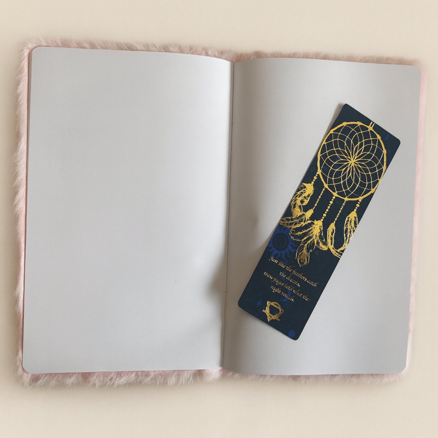 Soft Dream Journal - A5 - Pastel Pink - Before I Forget, open to blank pages with a dark illustrated bookmark by Quintessential Holistic Health Ltd