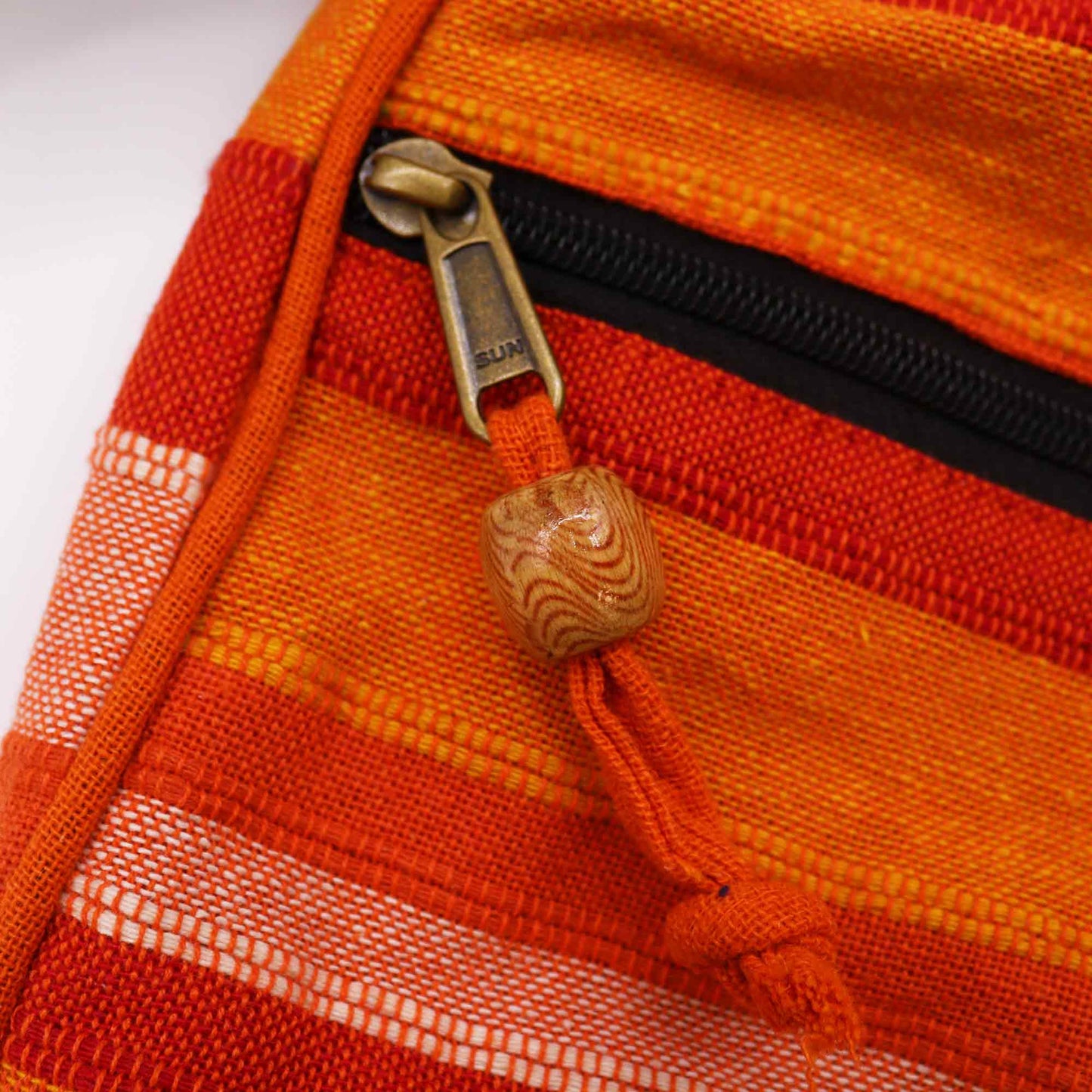 Handmade Eco-Friendly Cotton Nepalese Style Sling Bag with an Adjustable Strap - Large / Sunrise Orange product packaging on clean background from Quintessential Holistic Health Ltd