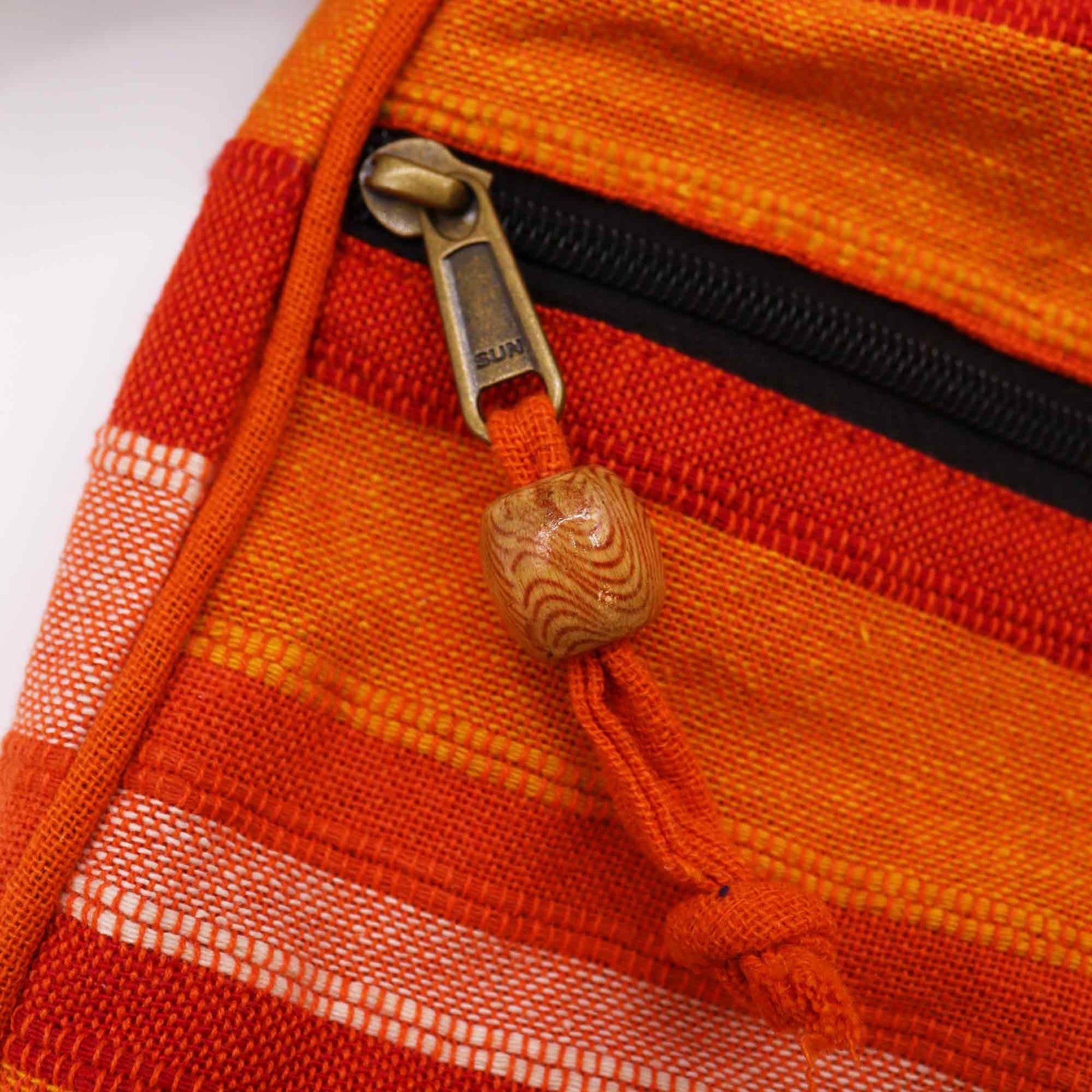 Handmade Eco-Friendly Cotton Nepalese Style Sling Bag with an Adjustable Strap - Large / Sunrise Orange product packaging on clean background from Quintessential Holistic Health Ltd