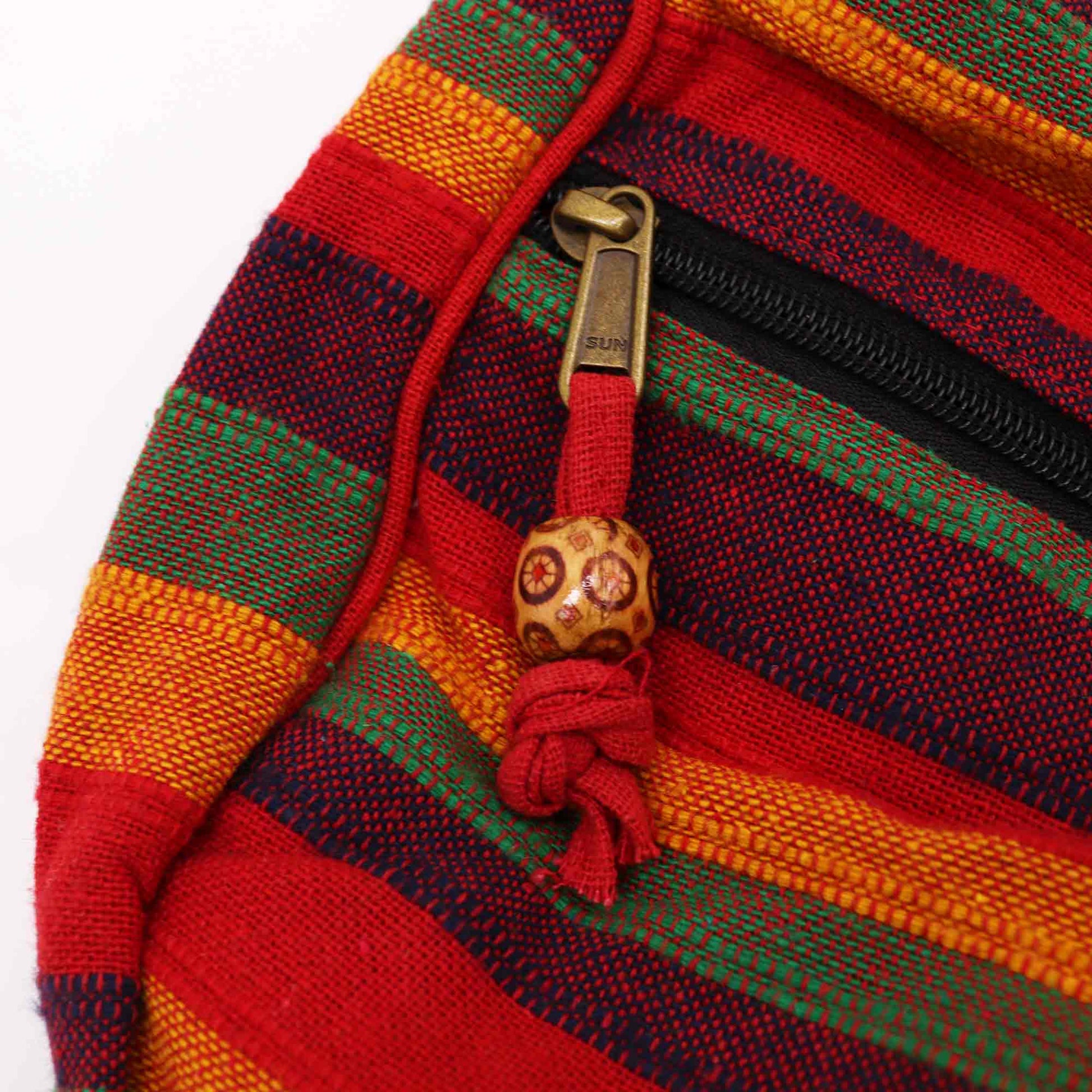 Handmade Eco-Friendly Cotton Nepalese Style Sling Bag with an Adjustable Strap - Large / Sunset Reds product packaging on clean background from Quintessential Holistic Health Ltd