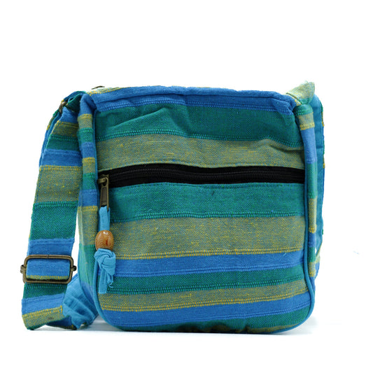 Handmade Eco-Friendly Cotton Nepalese Style Sling Bag with an Adjustable Strap - Large / Spring Meadows Green and Blue product packaging on clean background from Quintessential Holistic Health