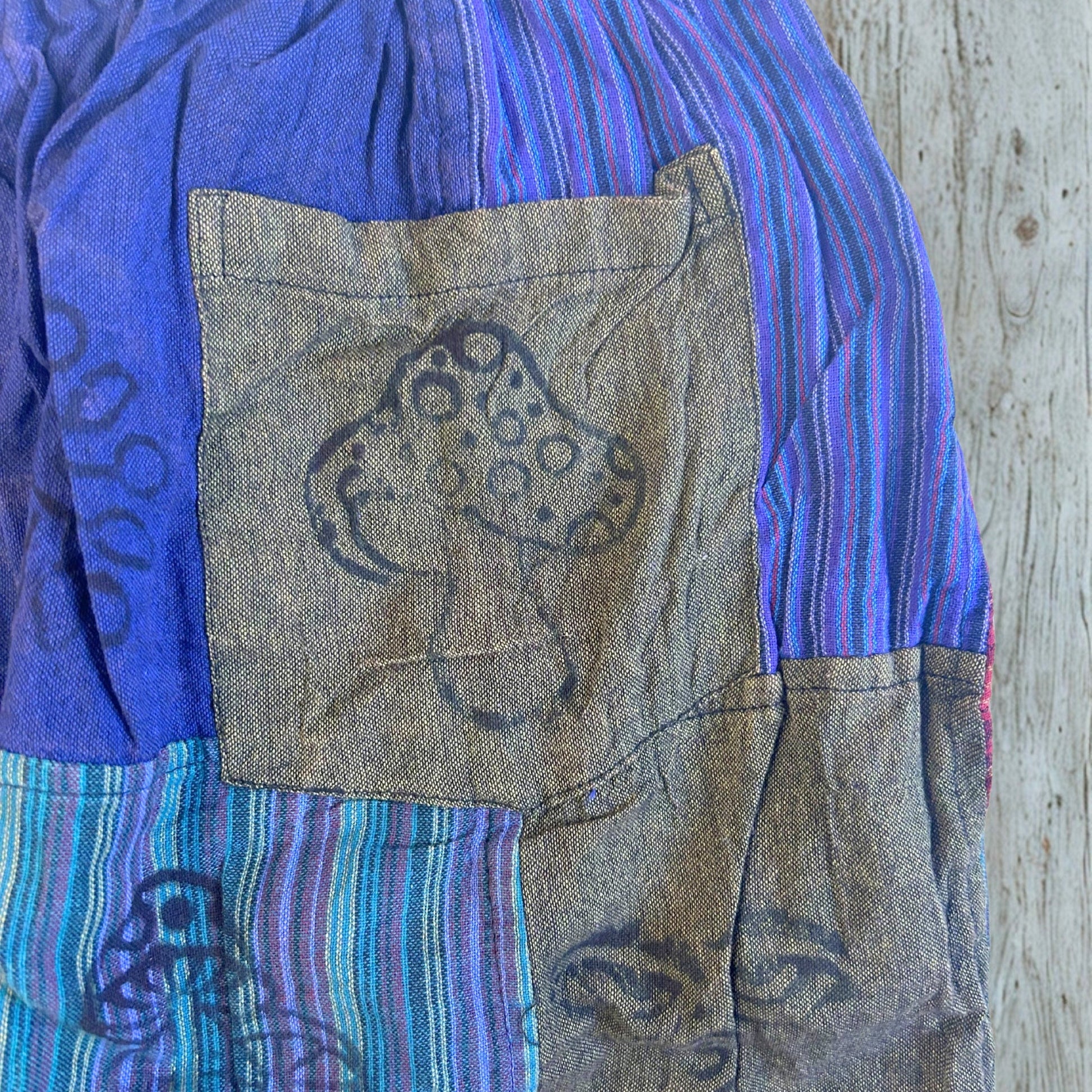 Nomad Sari Unisex Mushroom Pants - Small - Medium / Block Print / Purple Tones product packaging on clean background from Quintessential Holistic Health Ltd