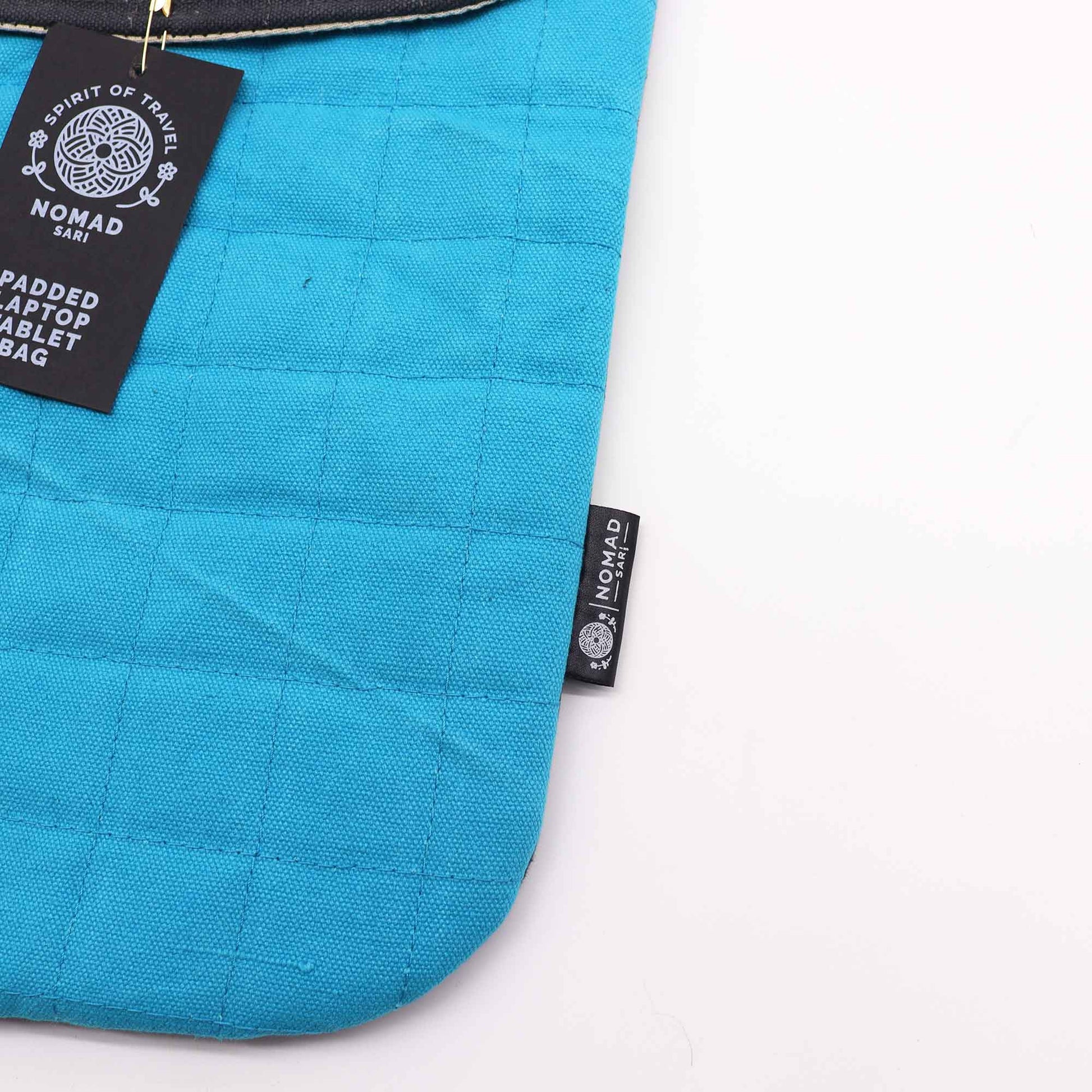 Handmade Cotton Laptop or Tablet Padded Pouch - Stonewashed / Terrific Turquoise product packaging on clean background from Quintessential Holistic Health Ltd