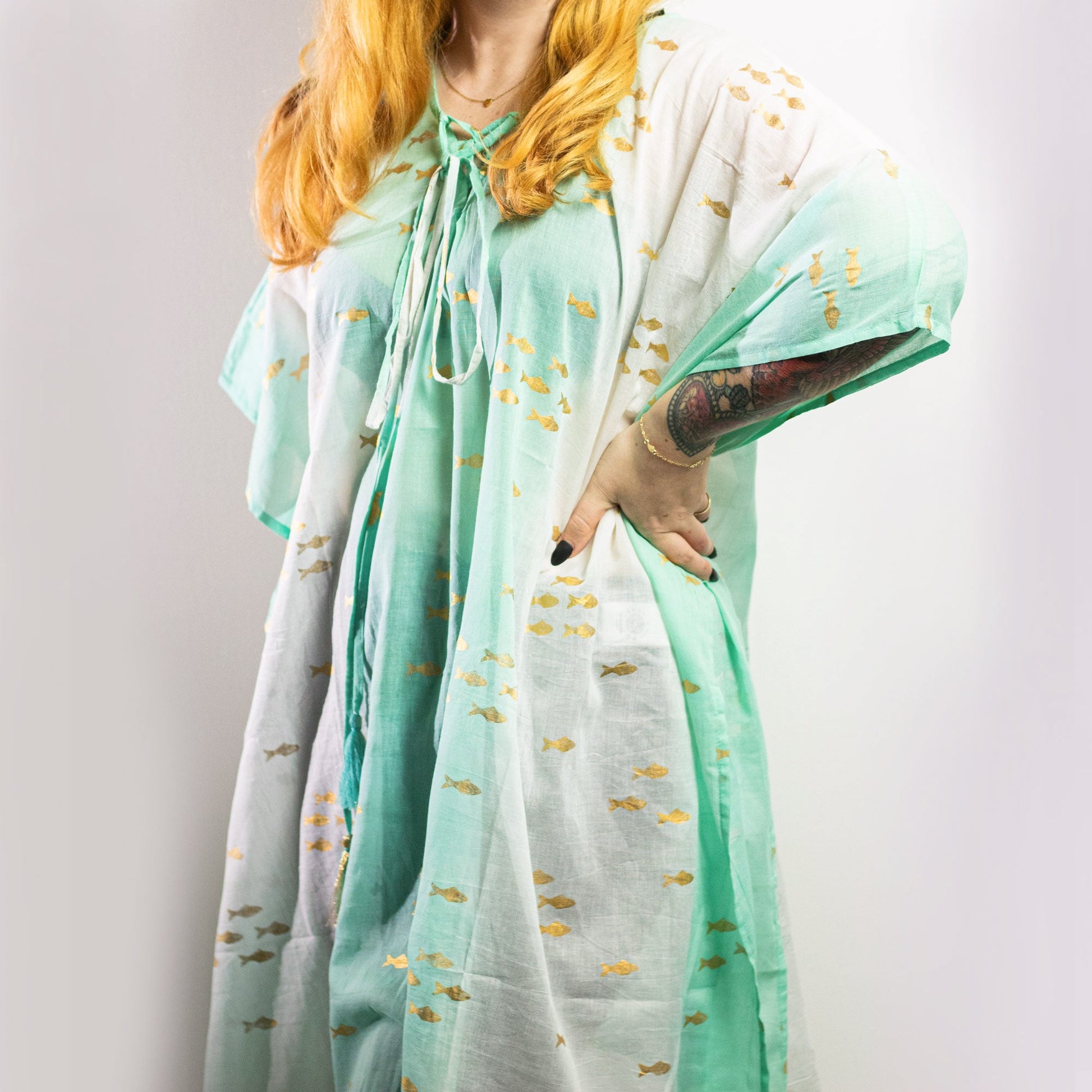 Hand Painted Eco-Friendly 100% Cotton Kaftan Sari Wrap - Golden Fish / Turquoise and White product packaging on clean background from Quintessential Holistic Health Ltd