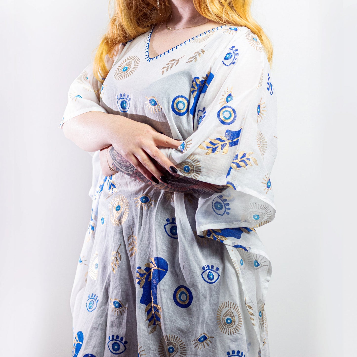 Hand Painted Eco-Friendly 100% Cotton Kaftan Sari Wrap - Al Seeing Eye / White, Blue and Gold product packaging on clean background from Quintessential Holistic Health Ltd
