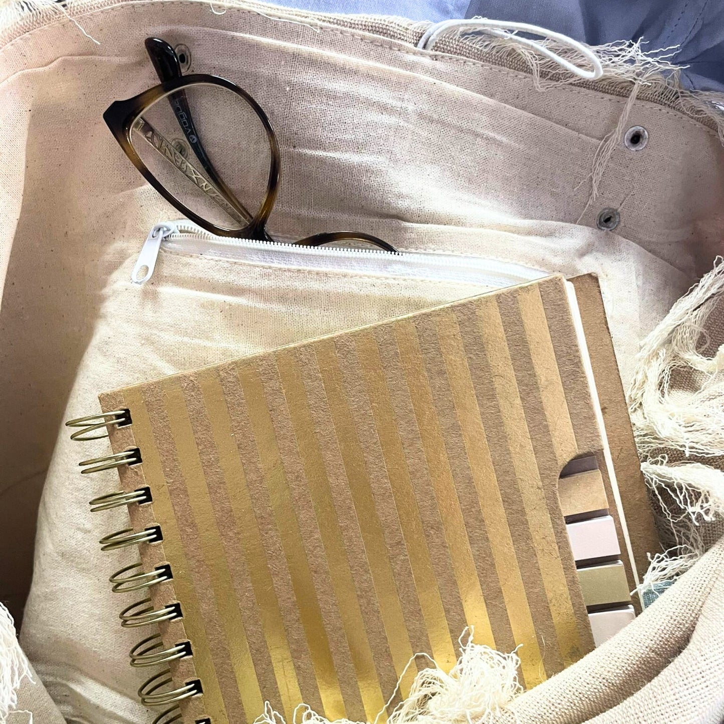 Natural Cotton Tote Bag with Leather Handles - Flower of Life showing an interior pocket holding glasses and a notebook by Quintessential Holistic Health Ltd