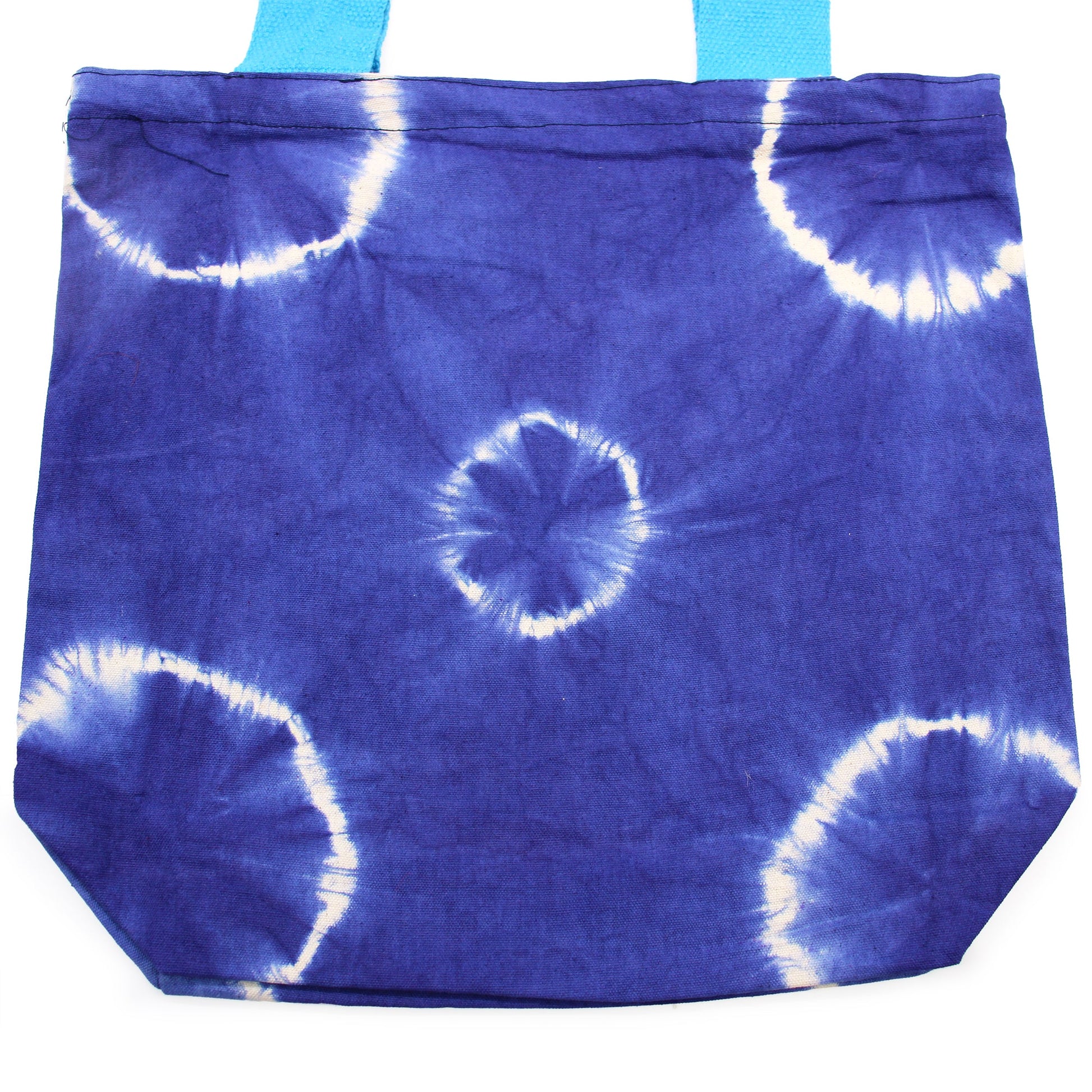 Handmade Eco-Friendly 100% Natural Cotton Tie-Dyed Bag - Blue Rings with a Blue Handle product packaging on clean background from Quintessential Holistic Health Ltd