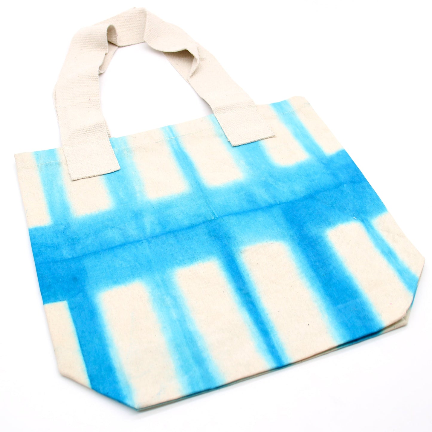 Handmade Eco-Friendly 100% Natural Cotton Tie-Dyed Bag - Sky Blue Blocks with a Natural Handle product packaging on clean background from Quintessential Holistic Health Ltd