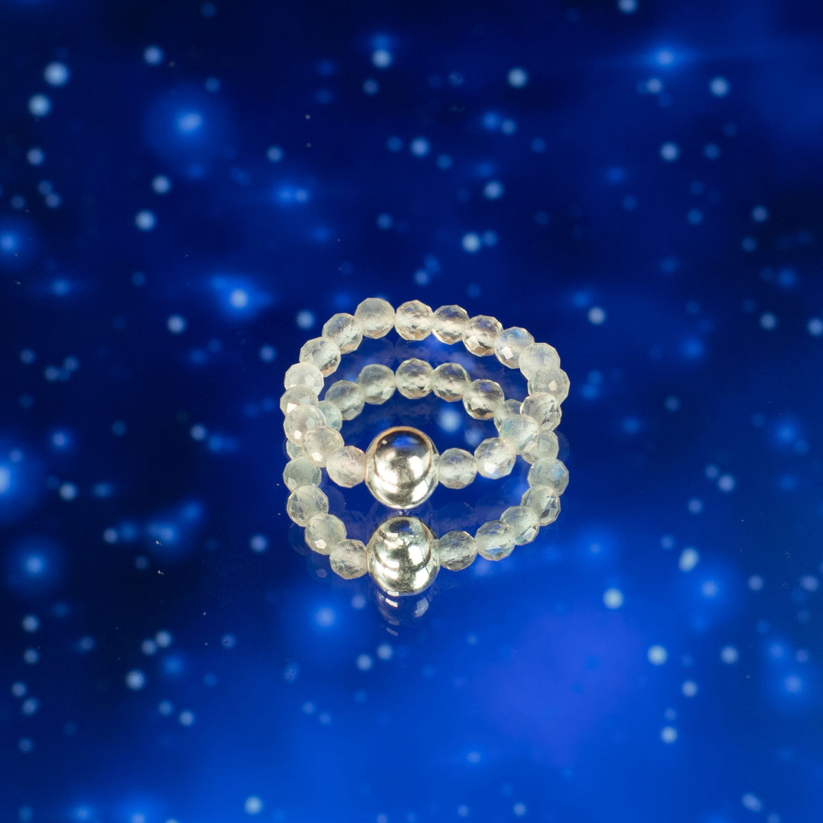 Mystical Nymph Spirit Gemstone 3 Ring Set - Northern Lights with translucent and silver-tone beads against a starry blue scene by Quintessential Holistic Health Ltd