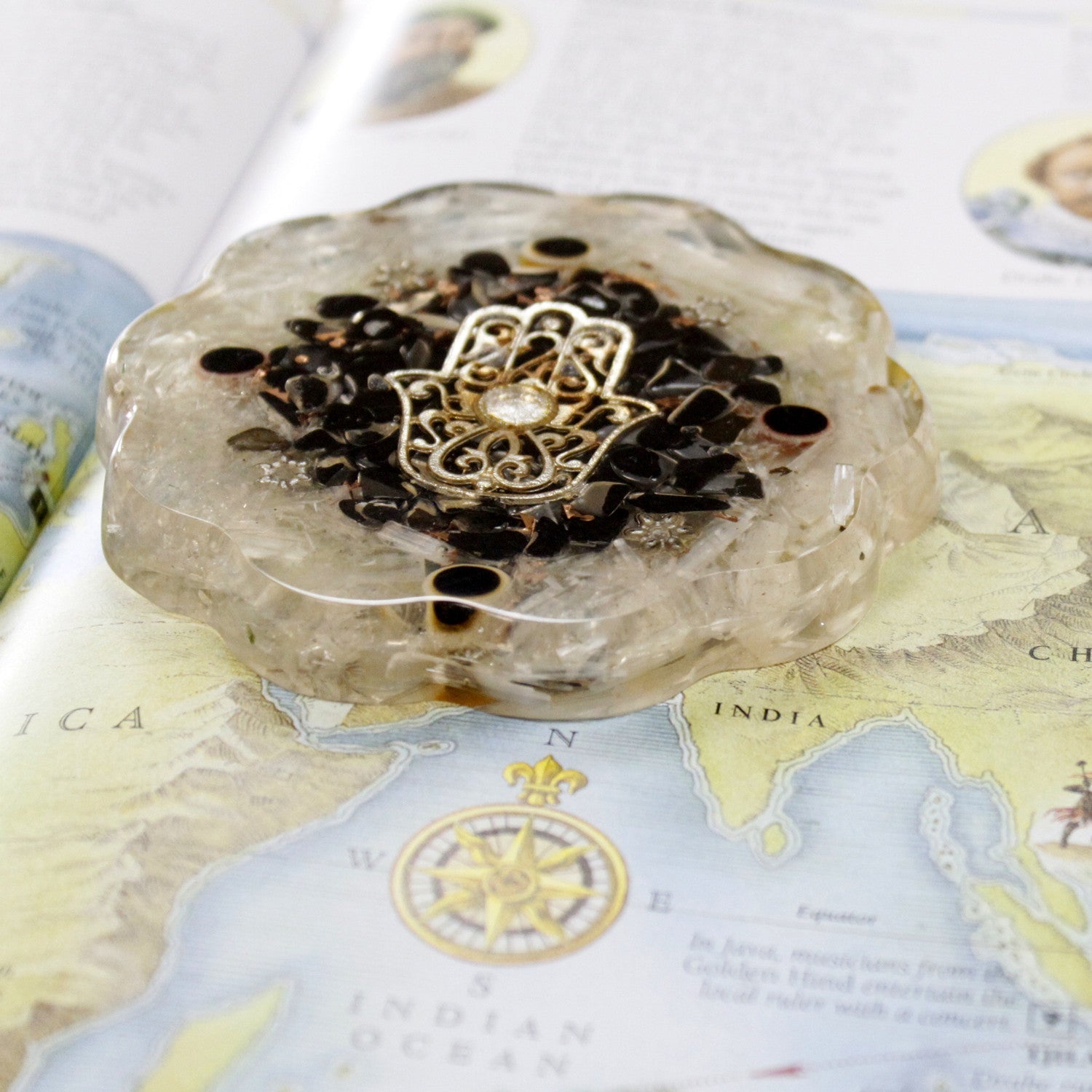 Handmade Orgonite Desk Power Pack / Paperweight - Medium / Hamsa with Sellonite / White, Brown and Gold product packaging on clean background from Quintessential Holistic Health Ltd