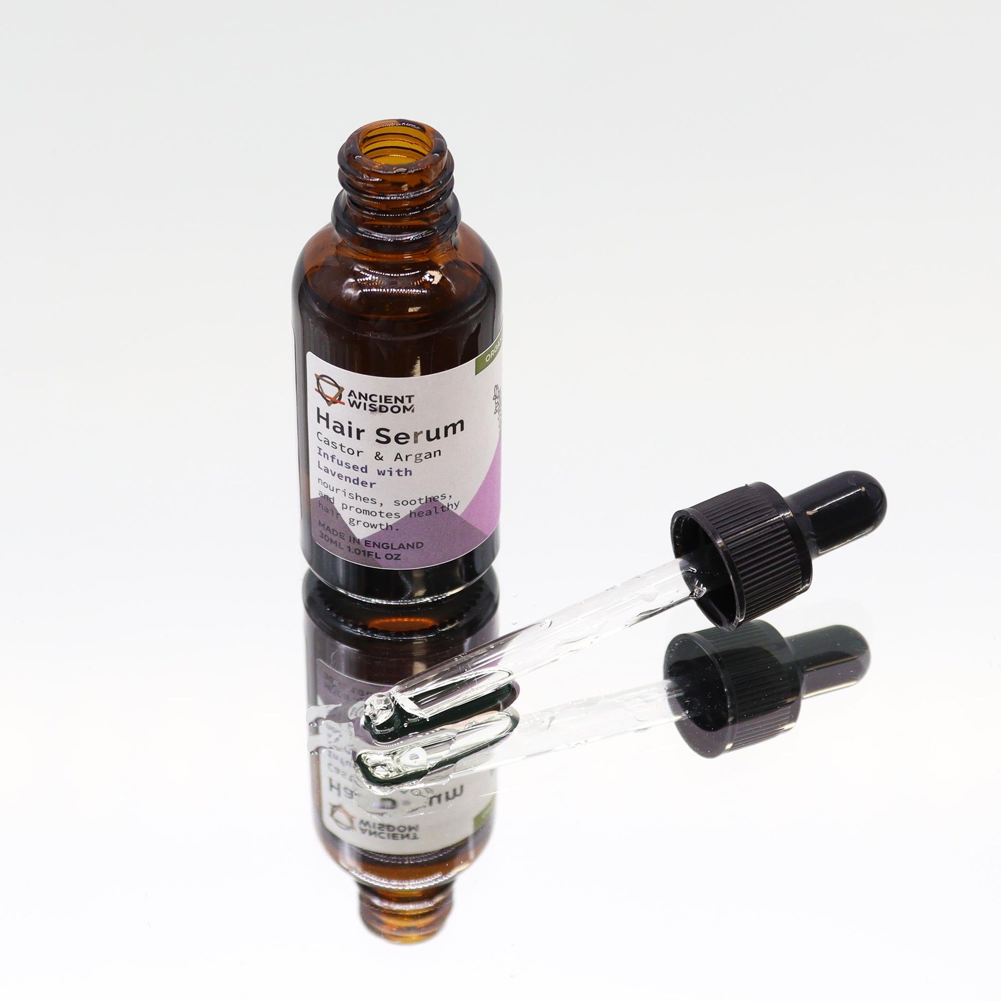 Organic Vegan-Friendly Lavender Hair Serum - 30ml, open amber bottle with two glass droppers alongside, by Quintessential Holistic Health Ltd