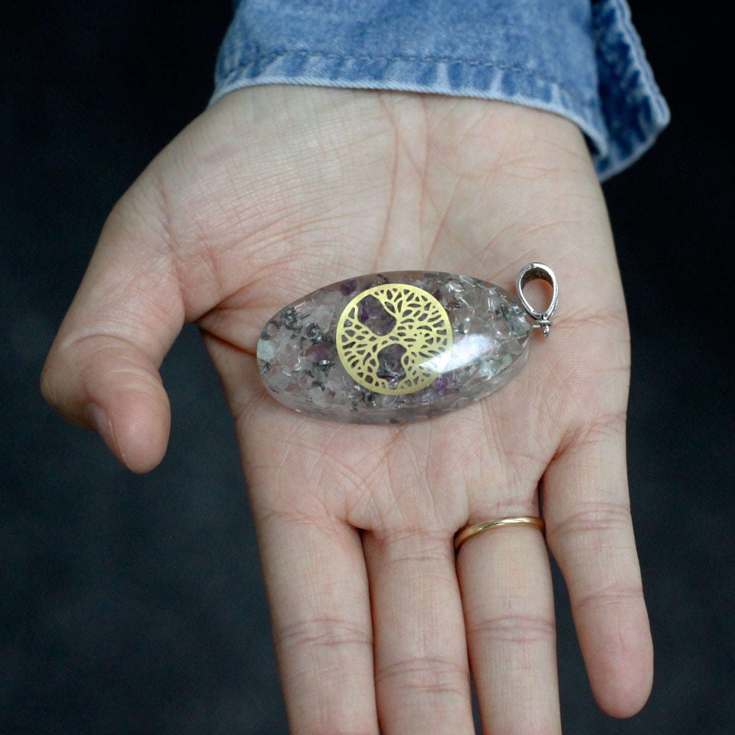 Handmade Orgonite Power Pendant - Oval / 7 Stone Chakra with Tree product packaging on clean background from Quintessential Holistic Health Ltd