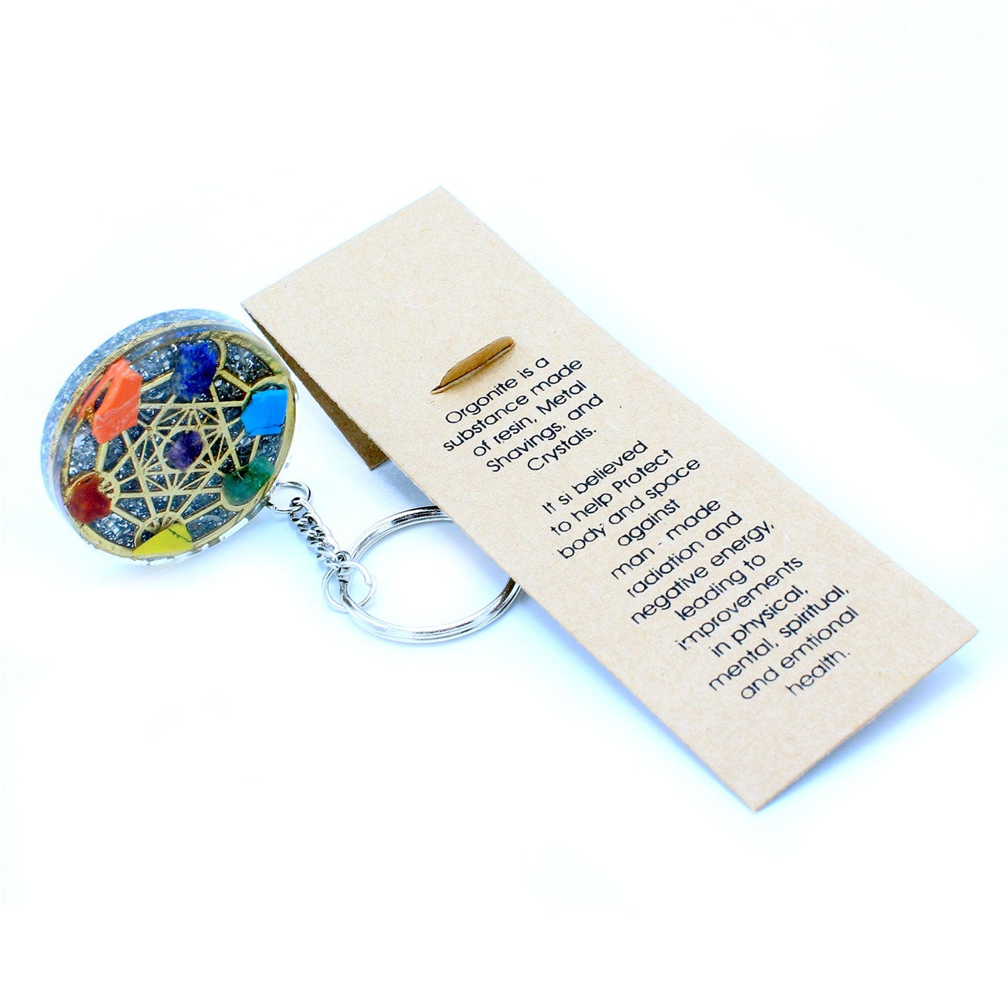 Handmade Orgonite Power Keyring - Round / Seven Chakra / Multicoloured product packaging on clean background from Quintessential Holistic Health Ltd