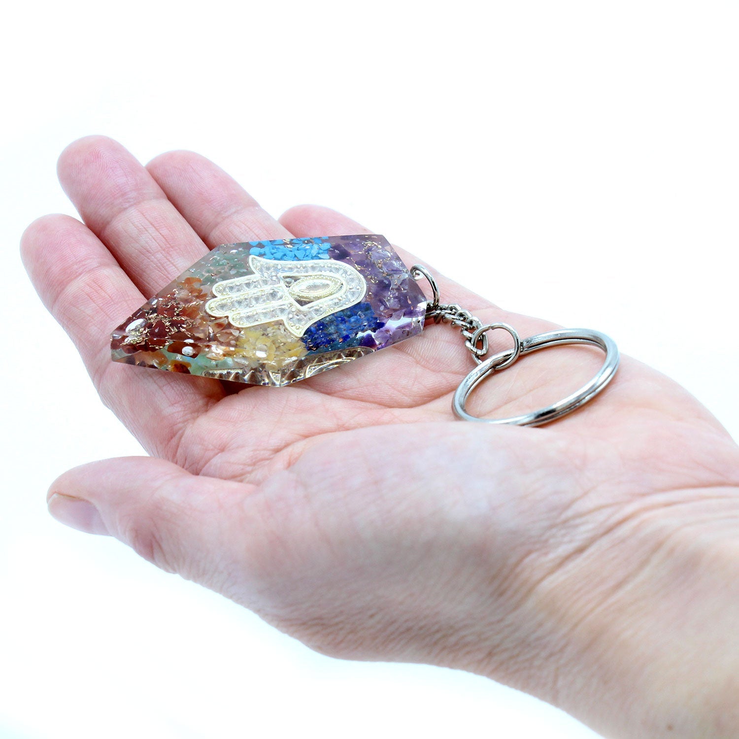 Handmade Orgonite Power Keyring - Pentagon / Chakra Hamsa / Multicolour product packaging on clean background from Quintessential Holistic Health Ltd