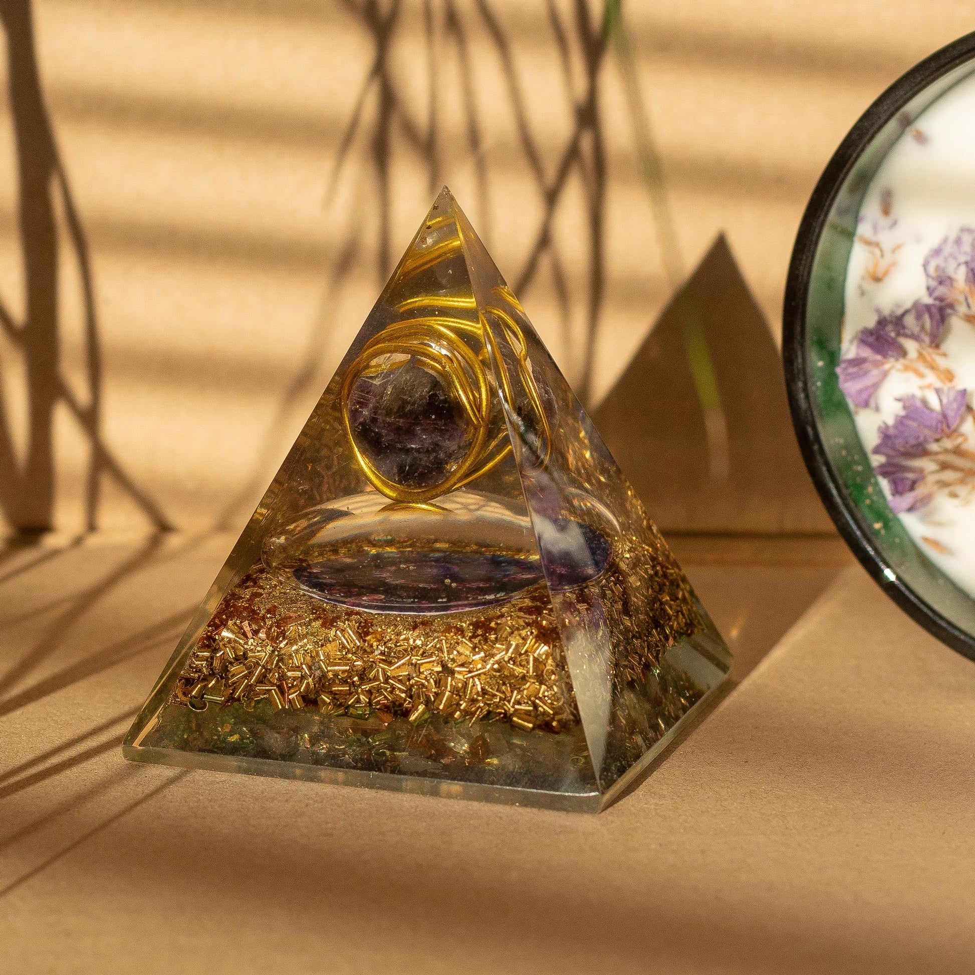 Handmade Orgonite Desk Power Pack / Paperweight - Medium / Pyramid / Amethyst with Copper / Purple and Gold product packaging on clean background from Quintessential Holistic Health Ltd