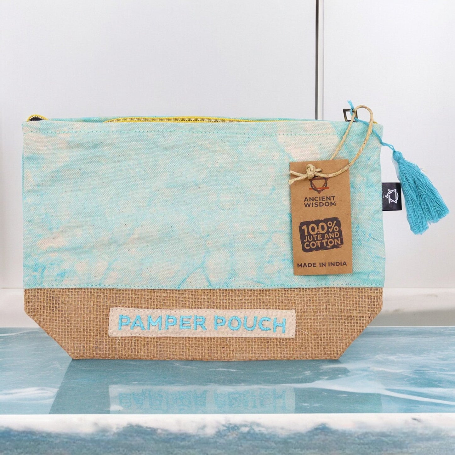 Eco-Friendly Jute and Cotton Pamper Pouch - Stonewash Blue product packaging on clean background from Quintessential Holistic Health Ltd