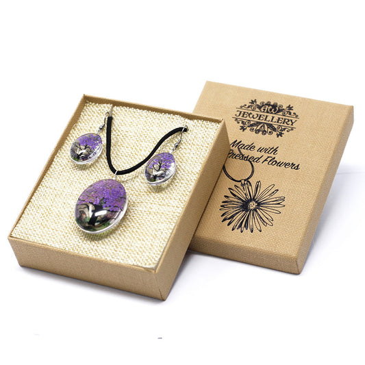 Pressed Flowers Pendant and Earring Set - Tree of Life / Lavender product packaging on clean background from Quintessential Holistic Health Ltd
