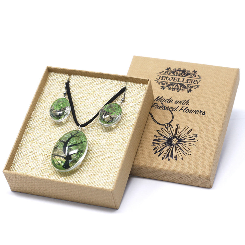 Pressed Flowers Pendant and Earring Set - Tree of Life / Green product packaging on clean background from Quintessential Holistic Health Ltd