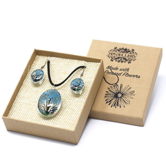 Pressed Flowers Pendant and Earring Set - Tree of Life / Teal product packaging on clean background from Quintessential Holistic Health Ltd