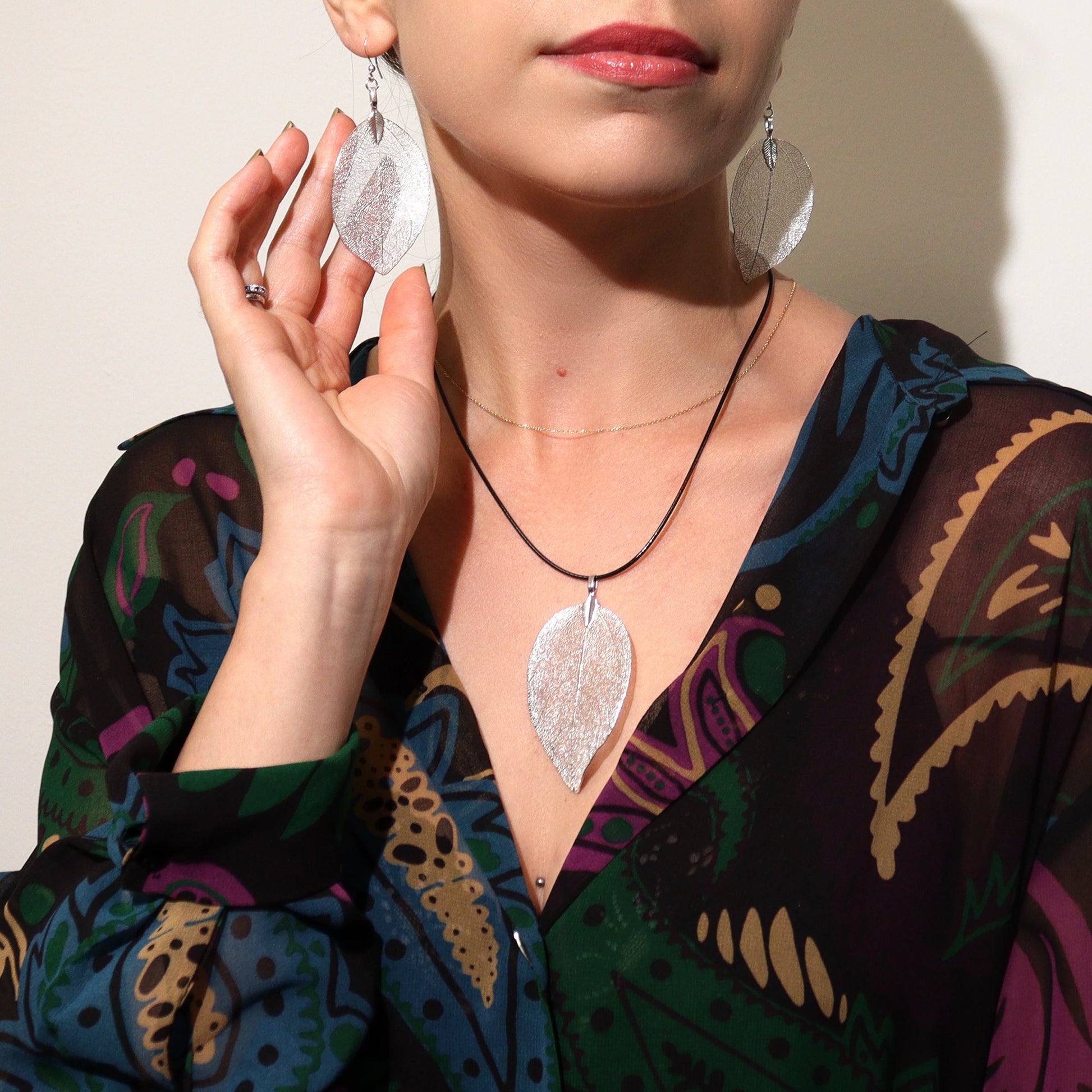 Real Leaf Earrings - Silver product packaging on clean background from Quintessential Holistic Health Ltd