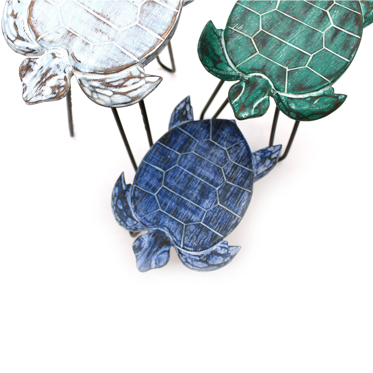 Set of 3 Eco-Friendly Albasia Wooden Plant Stands - Turtles, overlapping white, green and blue turtle-shaped tops with black legs by Quintessential Holistic Health Ltd