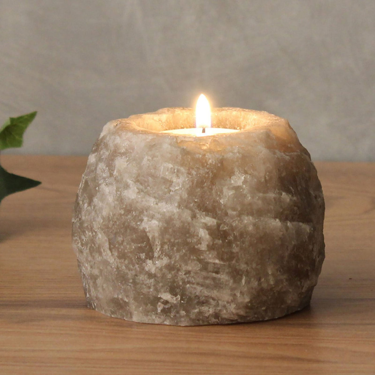 Himalayan Salt Candle Holder - Grey - Square - Single with softly glowing sides and a visible flame by Quintessential Holistic Health Ltd