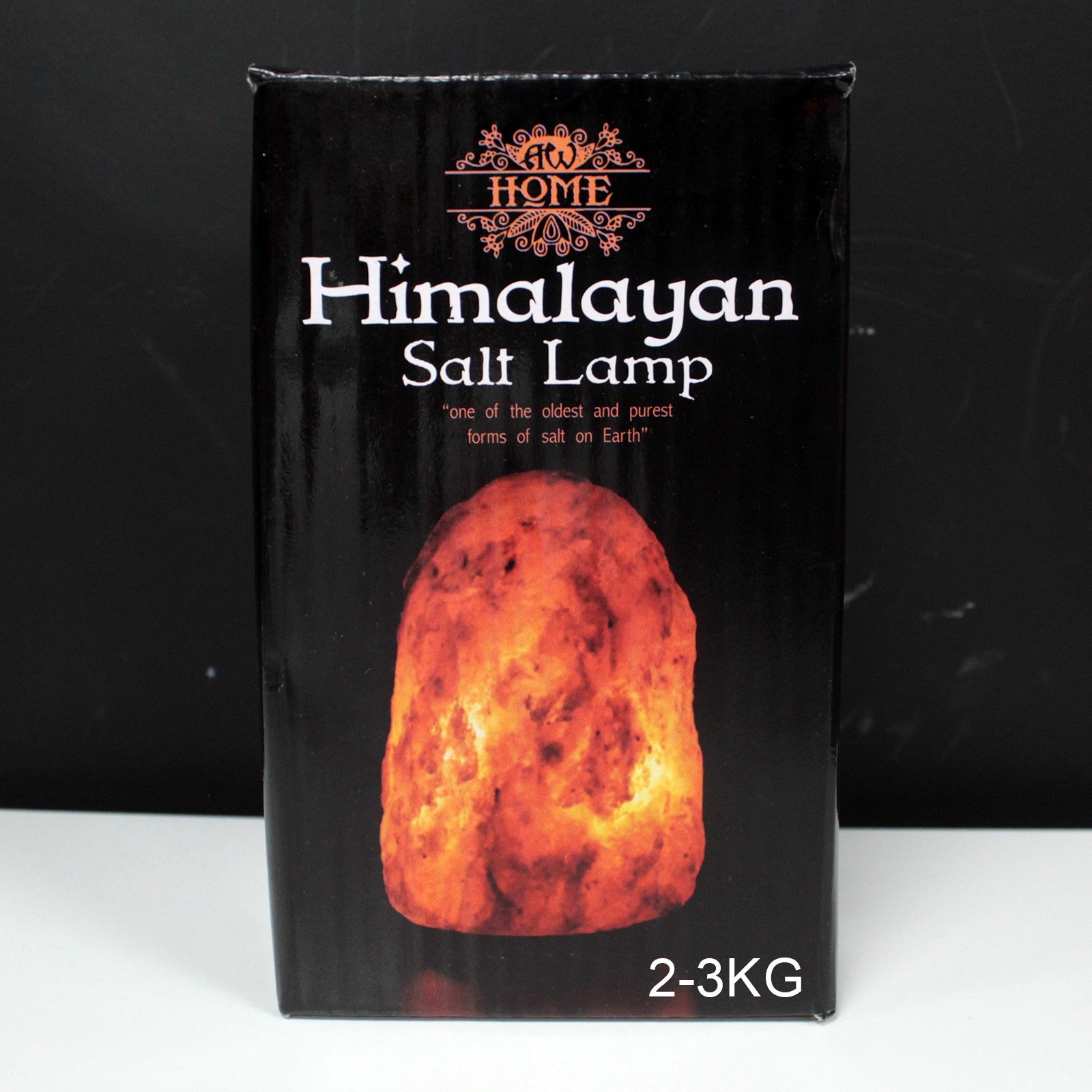 Hand Carved 240v Himalayan Salt Crystal Lamp with Base - Natural / 2Kg - 3Kg product packaging on clean background from Quintessential Holistic Health Ltd