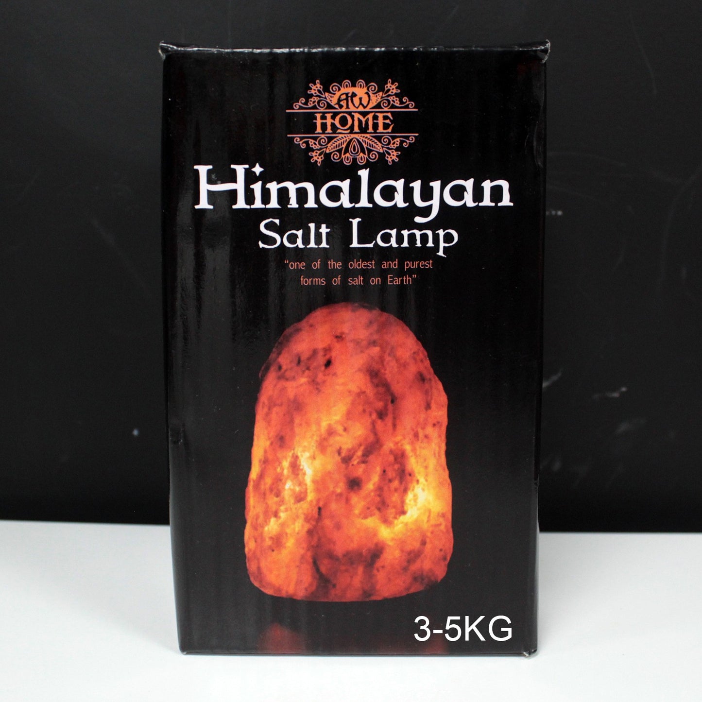 Hand Carved 240v Himalayan Salt Crystal Lamp with Base - Natural / 3Kg- 5Kg product packaging on clean background from Quintessential Holistic Health Ltd