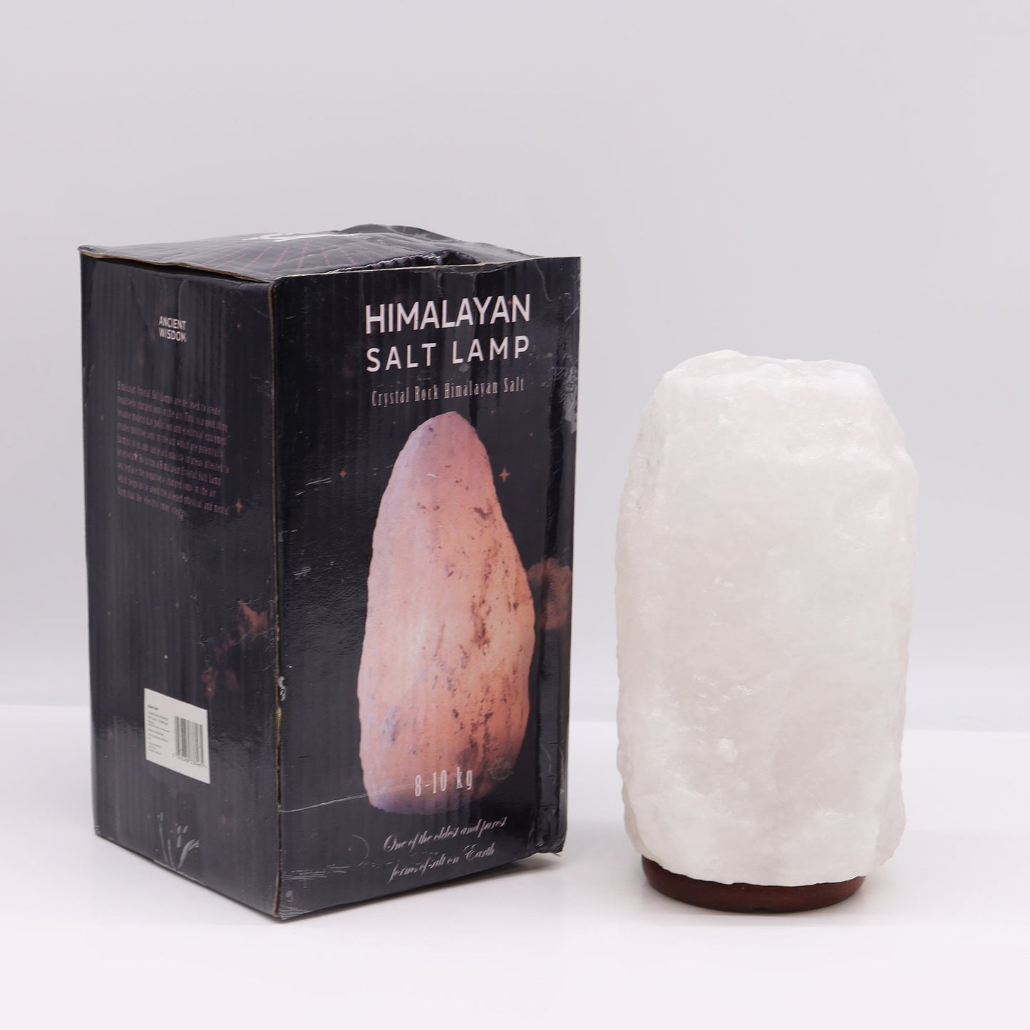Hand Carved 240v Himalayan Salt Crystal Lamp with Base - White and Natural / 8Kg - 10Kg product packaging on clean background from Quintessential Holistic Health Ltd