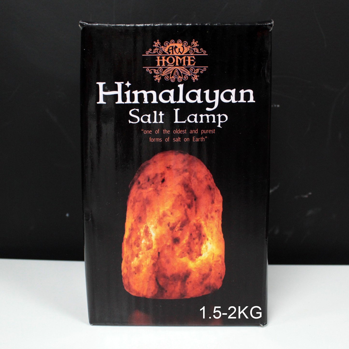 Hand Carved 240v Himalayan Salt Crystal Lamp with Base - Natural / 1.5Kg - 2Kg product packaging on clean background from Quintessential Holistic Health Ltd